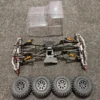 Chassis 1/10 Crawler met verschillende tuning onderdelen van Injora en banden met body!