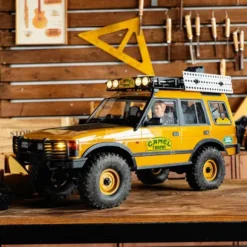 FMS 1/10 Land Rover Discovery 1st-Gen. FCX10 Scaler RTR (RS) Geel