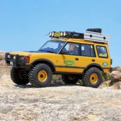 FMS 1/10 Land Rover Discovery 1st-Gen. FCX10 Scaler RTR (RS) Geel