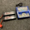 Traxxas Battery & charger completer pack (includes TRX2973 Dual iD charger (1), TRX2890X 6700mAh 14.8V 4-cell 25C LiPo battery (2) TRX2997 in een nette staat met garantie!