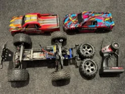 Traxxas Stampede 2WD VXL Monster Truck met 2e body en luxe aluminium dempers + tuning onderdelen + Traxxas stalen aandrijfassen (gebruikt)!