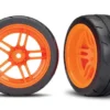 Traxxas Tires and wheels, assembled, glued (split-spoke orange wheels, 1.9″ Response tires) (extra wide, rear) (2) (VXL rated) – TRX8374A