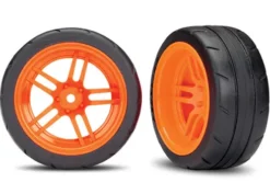 Traxxas Tires and wheels, assembled, glued (split-spoke orange wheels, 1.9″ Response tires) (extra wide, rear) (2) (VXL rated) – TRX8374A