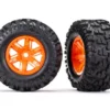 Traxxas Tires & wheels, assembled, glued (X-Maxx orange wheels, Maxx AT tires, foam inserts) (left & right) (2) – TRX7772T