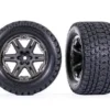 Traxxas Tires & wheels, assembled, glued (2.8′) (RXT charcoal gray & black chrome wheels, Gravix tires, foam inserts) (4WD electric front/rear, 2WD electric front only) (2) (TSM rated) – TRX6764-BLKCR