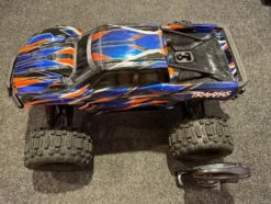 Traxxas X-Maxx 8S Belted Brushless Monster truck RTR Oranje (Versie 2024/2025) (zonder motor/regelaar/steun)!